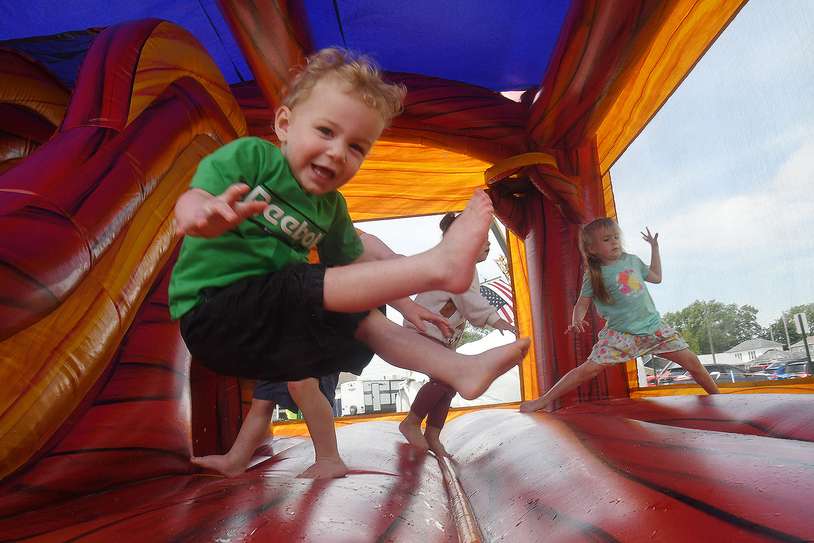 The Kids Zone provided youngsters so much fun with bounce houses, games and activities. ©Ben Robinson/Color Green Photo